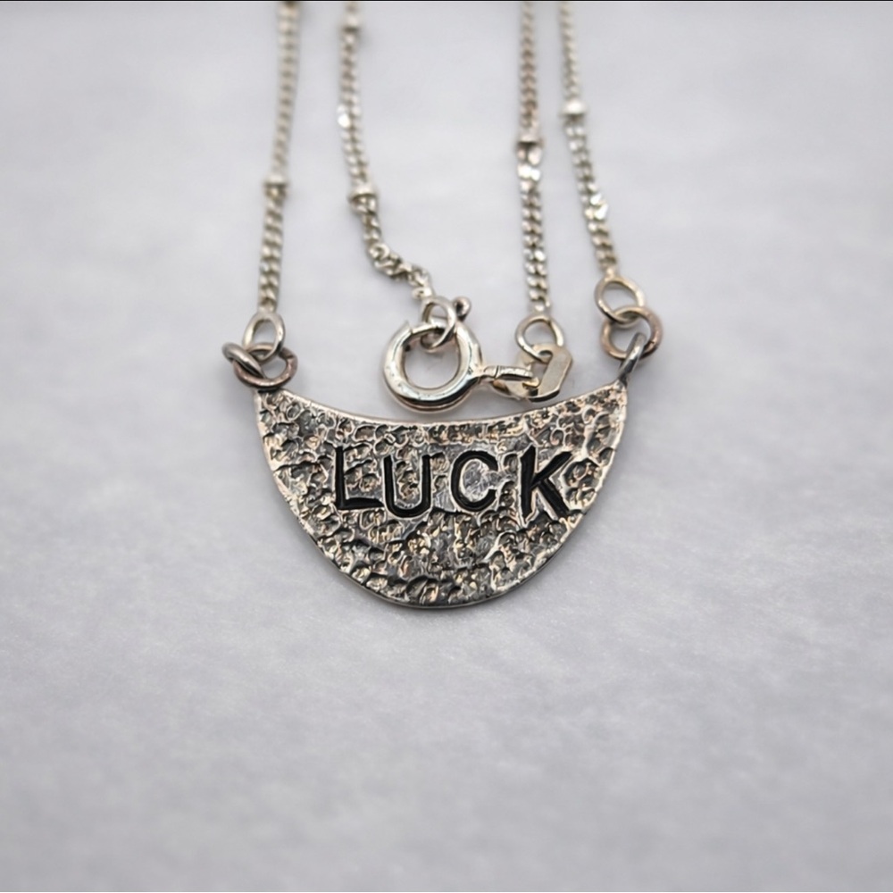 925 silver necklace with beautiful Pendant carved luck on it